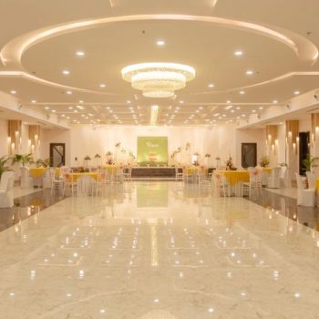 Elegant event hall interior at Best Resort in Chitrakoot with modern lighting